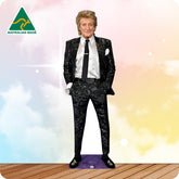 Cardboard cutout of a man in a suit with 'Australian Made' logo on a colorful background